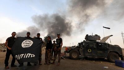 A week after ISIL occupied Mosul, 81 per cent of the city's households stated that they now felt safe. Safin Hamed / AFP