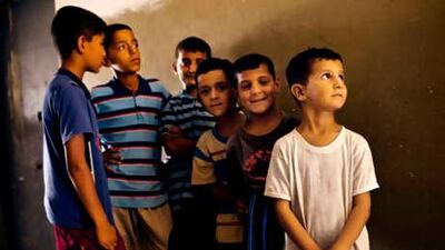 The children of a man whose 11 brothers were killed by al Qa'eda. He now cares for 70 orphans in Diala.