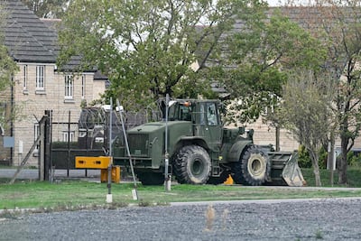 Heavy machinery blocks an entrance to RAF Fairford. AFP