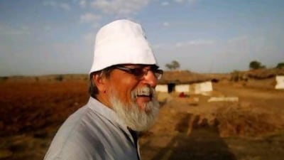 Prof. Anil Gupta listens to villagers during a visit to the village of Nayapura in the Sehore district of Madhya Pradesh, India.