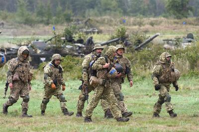 Ukrainian servicemen take part in the joint Rapid Trident military exercises with the US and other Nato countries nor far from Lviv in September. AFP