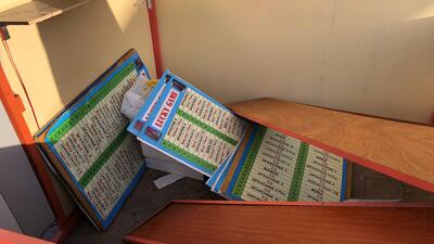 Operators offered smart phones as prizes, but players seldom appeared to win them, usually walking away with pens and cans of deodorant as consolation prizes. Chris Whiteoak / The National