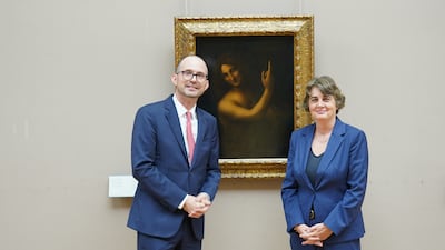 Manuel Rabate, left, and Laurence des Cars with 'Saint John the Baptist'. Janelle Meager / The National