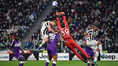 Juve's Matthijs de Ligt challenges Fiorentina goalkeeper Bartlomiej Dragowski to a cross. Getty