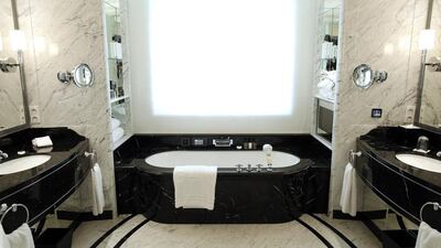 Inside a marble bathroom in one of the rooms at Peninsula Paris. A penthouse suite costs €25,000 a night. Benoit Tessier / Reuters