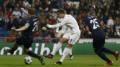Cristiano Ronaldo scores Real Madrid’s fifth goal against Malmo in the Champions League on Tuesdsay night. Juan Medina / Reuters