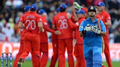 Suresh Raina, who has had a quiet tournament by any standards, was next to go. Andrew Yates / AFP