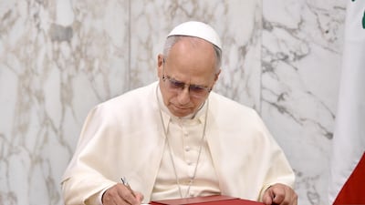 He wrote a dedication in the guest book at the end of his courtesy visit. EPA