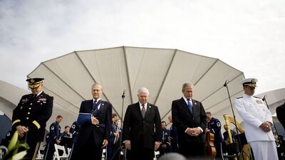 Donald Rumsfeld, second from left, during a Pentagon Memorial dedication ceremony in Arlington, Virginia, on the 2008 anniversary of the 9/11 terror attacks. Bloomberg