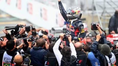 SAO PAULO, BRAZIL - NOVEMBER 25: Sebastian Vettel of Germany and Red Bull Racing celebrates in parc ferme as he finishes in sixth position and clinches the drivers world championship during the Brazilian Formula One Grand Prix at the Autodromo Jose Carlos Pace on November 25, 2012 in Sao Paulo, Brazil. (Photo by Clive Mason/Getty Images) *** Local Caption *** 156934319.jpg
