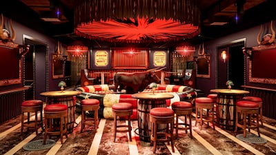 Diners can try their balancing skills on a mechanical bull free of charge. Photo: Rodeo Drive