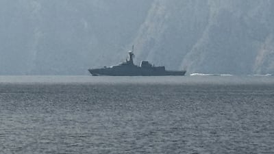 A naval vessel sailing in the Strait of Hormuz. Ships are avoiding passing through the strait because of the regional war. AFP