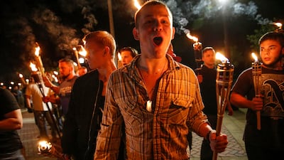 White nationalist groups march in Charlottesville, Virginia, in August 2017. Mr Trump famously said there were 'very fine people' at the event. AP