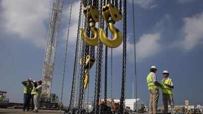 An oversized crane gets prepared for installation of a super-sized element (SSE 63), the first piece of the steel dome of Louvre Abu Dhabi. Silvia Razgova / The National