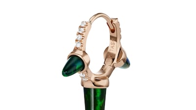 A triple spike earring by Maria Tash in diamonds, rose gold and opal. Photo: Maria Tash