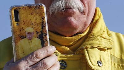 Zakkour shows his mobile phone