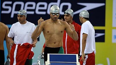Obaid al Jasmi, centre, with his brothers, Saeed, Bakhit and Faisal, before the start of their men´s 4x100-metre freestyle heat.
