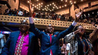 Zimbabwe's members of parliament celebrate after Mugabe's resignation on November 21, 2017 in Harare. Jekesai Njikizana / AFP