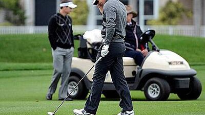 Rory McIlroy went off after this shot on the 18th hole went into the water during the second round play in Florida. Doug Murray / Reuters