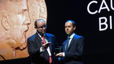 Kurdish mathematician, Cauchar Birkar, 40, right, receives the Fields Medal award, the most prestigious prize in mathematics, during the International Congress of Mathematicians (ICM 2018) in Rio de Janeiro, Brazil, on August 1, 2018. AFP