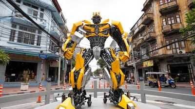 A large-scale figure of Bumblebee, a fictional character from the USA film Transformers, displayed at an intersection in Bangkok, Thailand, 31 July 2023. Thai authorities made a large-scale figure of Bumblebee and displayed it on a circle as a traffic sign for the driver's gaze to pay attention in an effort to prevent road accidents on a busy intersection as well as street decoration to attract tourists. EPA / RUNGROJ YONGRIT