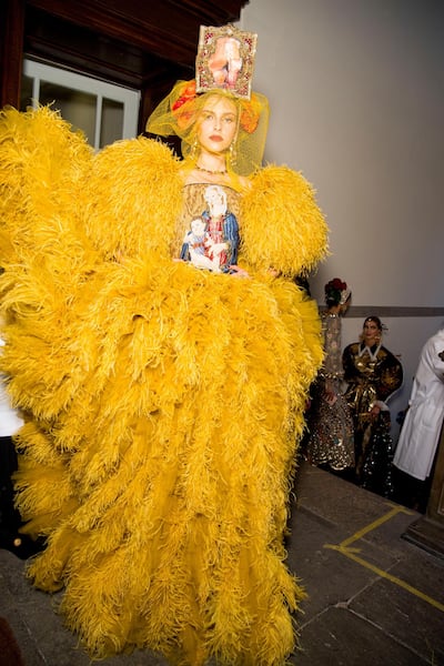 Dolce & Gabbana return to religion as a theme. The opening look from its latest Alta Moda collection featured Ghirlanaio’s “Madonna and Child” hand stitched on its bodice. Getty Images