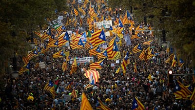 Nearly half a million demonstrators took to the streets of Barcelona to protest Madrid's direct rule over Catalonia. AP Photo/Emilio Morenatti)
