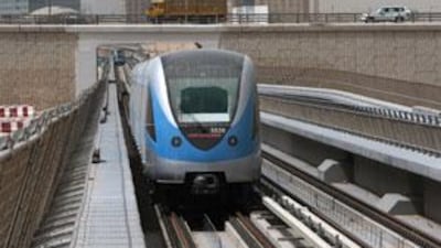 A Metro train parked at Jebel Ali station in Dubai.