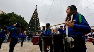 A Palestinian marching band plays during the ceremony. Reuters