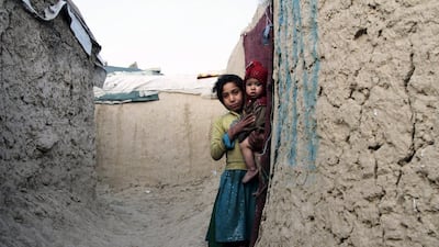 Internally displaced Afghan children take shelter in a camp on the outskirts of Kabul. Photo: Hedaytullah Amid / EPA