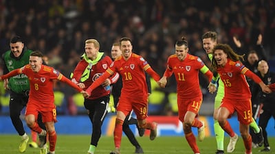 Wales' players celebrate victory and qualification for the Euro 2020 finals. Getty