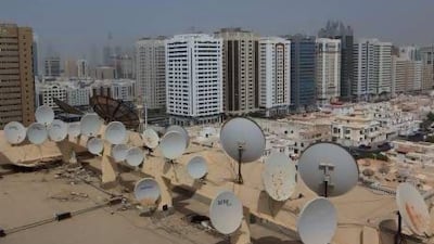 The challenge for companies is the proliferation of satellite dishes, which pick up the channels. Ravindranath K / The National