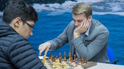 Alireza Firouzja from Iran playing against Vladislav Kovalev from Belarus during the first round of the 82st edition of the Tata Steel Chess Tournament. EPA