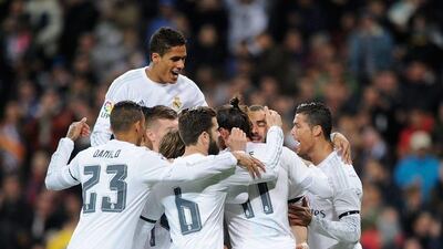 Real Madrid players celebrate during the La Liga match between Real Madrid CF and Sevilla FC at Estadio Santiago Bernabeu on March 20, 2016 in Madrid, Spain. (Photo by Denis Doyle/Getty Images)