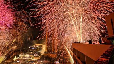 New Year’s Eve fireworks erupt over the Chao Praya River in Bangkok. AFP