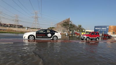 Flooded roads near Discovery Gardens area in Dubai. Pawan Singh / The National