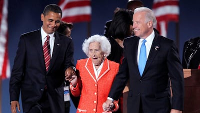 US President-elect Senator Barack Obama and Vice President-elect Senator Joe Biden stand with Biden's mother Jean during their election night victory rally in Chicago, November 4, 2008. Reuters
