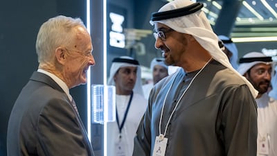 Sheikh Mohamed greets a guest during his tour