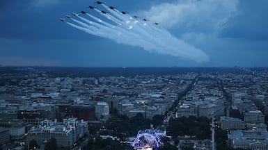 The US Air Force's demonstration squadron, the Thunderbirds, and the US Navy's Blue Angels perform a flyover during the UFC Freedom 250 mixed-martial arts event, at the White House, in Washington. AFP