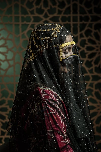 A portrait by Zayed University student Sara Al Afeefi explores the relationship between Emirati heritage and contemporary identity through traditional dress. Photo: Bassam Freiha Art Foundation
