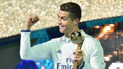 Cristiano Ronaldo rounded off a successful 2016 with a Club World Cup winners medal and the trophy for the tournament's best player. Kazuhiro Nogi / AFP