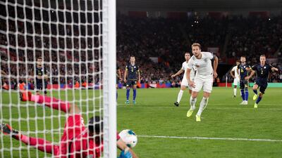 Kosovo's Aro Muric saves a penalty from England's Harry Kane. Reuters