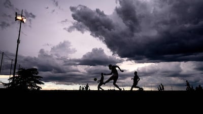 Olympique Lyonnais' team players and US Port-Valais' players fight for the ball during a friendly football match between in Evian les Bains at the Camille Fournier stadium, part of the Olympique Lyonnais training camp in the city. AFP