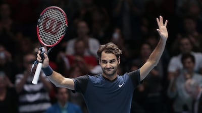 Roger Federer salutes the crowd after his ATP World Tour Finals victory over Stan Wawrinka. Suzanne Plunkett / Reuters