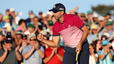 Sergio Garcia of Spain reacts to his putt on the 18th hole during the third round. AFP