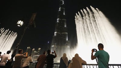 The backdrop of the world's tallest building, the Burj Khalifa, only adds to the wonder of the Dubai Fountain. Reuters / Ahmed Jadallah