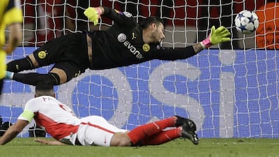 Monaco's Radamel Falcao, below, heads the ball to score the team's second goal. Claude Paris / AP Photo