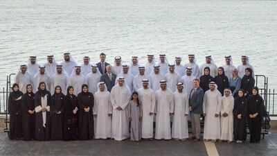 Sheikh Mohammed bin Zayed, Crown Prince of Abu Dhabi Deputy Supreme Commander of the Armed Forces, stands for a photo with Emirates Nuclear Energy Corporation members, during a Sea Palace barza. Seen with Sheikha Salama bint Mohammed (centre), Khaldoon Al Mubarak, CEO and Managing Director Mubadala, Chairman of the Abu Dhabi Executive Affairs Authority and Abu Dhabi Executive Council Member (10th R), and Saif Al Hajeri, Chairman of Department of Economic Development, and Abu Dhabi Executive Council Member (11th R). Mohammed Al Hammadi / Crown Prince Court - Abu Dhabi