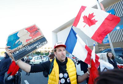 A French activist holds a poster reading 'Resistance'. Reuters