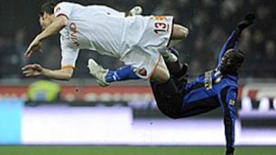Inter's young Ghanian-born forward Mario Balotelli, right, was abused by some Roma fans last season.